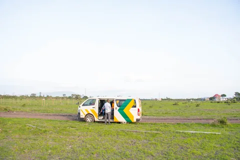 Luxe Homes site-visit van on the plots at Alma Gardens, Jujafarm