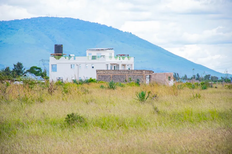 Neema Gardens open plots with Kilimambogo (Ol Donyo Sabuk) hill in the background